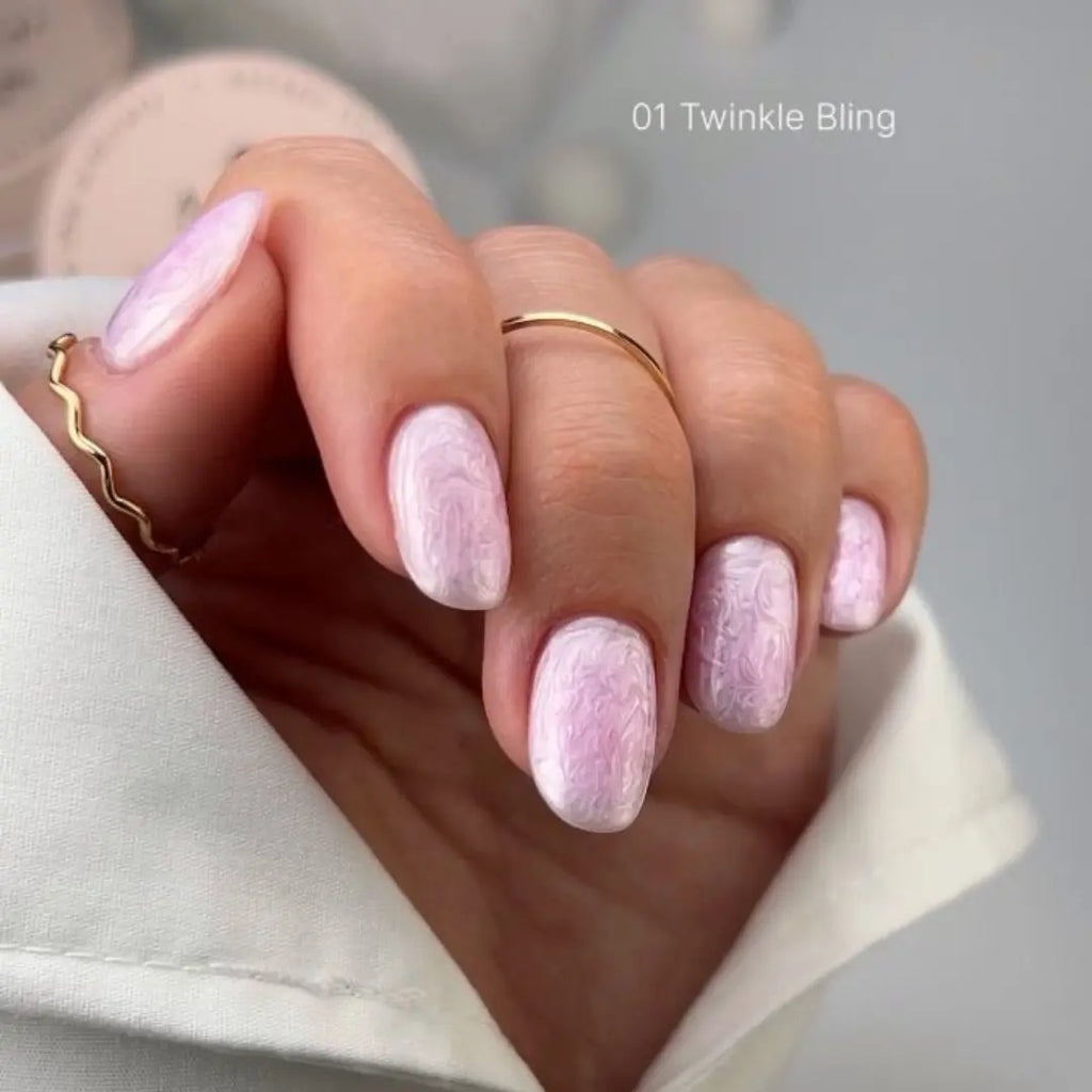 Soft pink pearl builder gel texture swatch, twinkle effect on nails